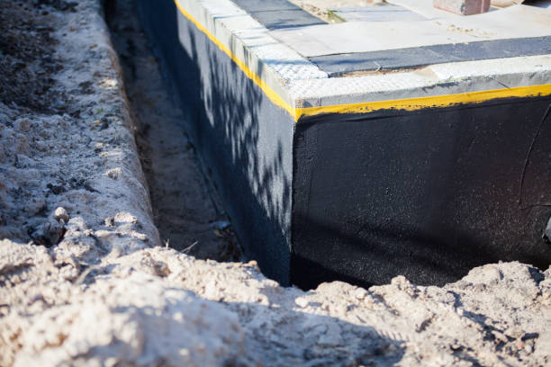 Professional Waterproofing technician working in Glen Rock, NJ